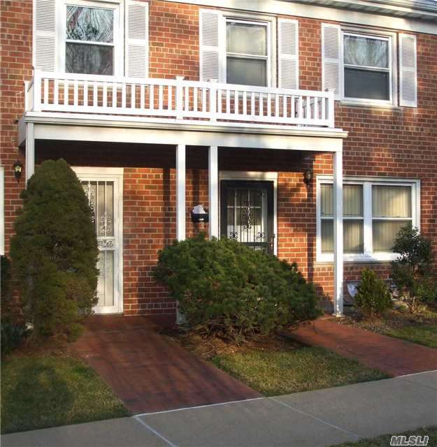 Beautiful Two Story Condo. 1st Floor - Living Room, Formal Dining Room, Eat In Kitchen & 1/2 Bath. 2nd Floor - Three Bedrooms & Full Bath. Includes Pull Down Attic, Full Finished Basement W/ Laundry Room & One Parking Spot. Oak Floors Throughout.