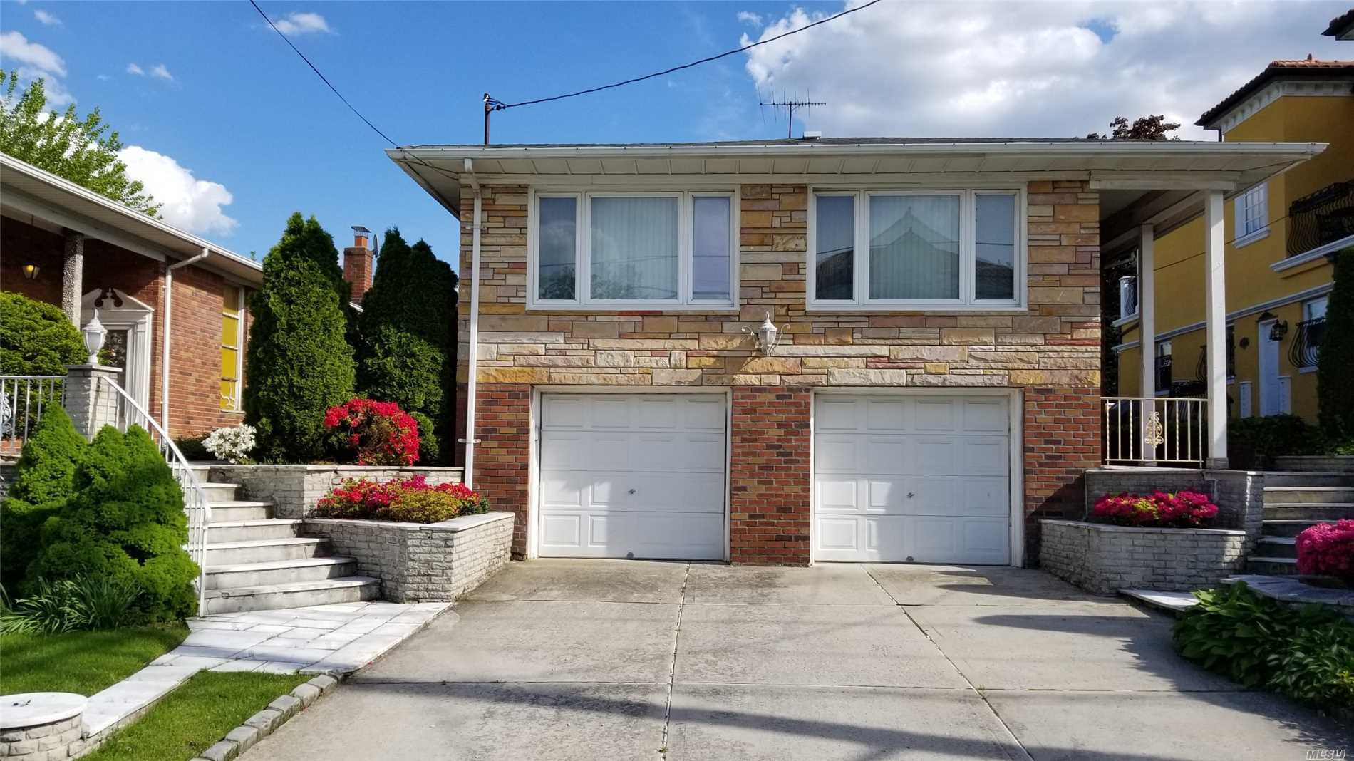 Spacious Over-size Brick Hi-Ranch Located On A Private St. In Weeks Woodlands Futures Lr. Dr. Eik. 4 Beds.2 Full Bths On The Main Level . And Full Fin. Basement To A Nice Den .One Full Bth. Laundry Rm. Util. 2 Car Garage Beautiful Private Yard, Near Bay Terrace Shopping Center And Close To Transportation Buses & LIRR. Convenience To All Major Highways