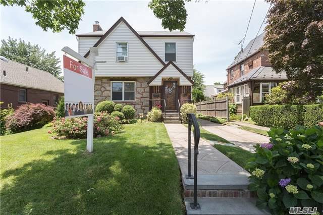 Spacious, Sun Soaked Brick/Vinyl Colonial Maintained In Excellent Condition. Side Hall Entry, 3 Bedrooms, 1.5 Baths, Kitchen With Double Sink And Room To Roam. Beautiful Herringbone Oak Floors In Great Shape, Anderson Windows, Good Closet Space, Lovely Backyard. Mostly Newer Appliances, Finished Basement, Garage, Close To Buses & Shops. Ps 159 & Is 025