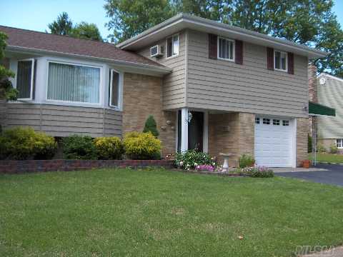 Showcase Home!  This Totally Updated 4 Bdrm Split Has It All.  A Great Mid-Block Location.  Move Right In.