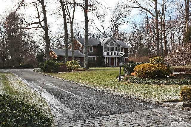 Classic Cedar-Shingled Center Hall Colonial W/Large Entry Foyer,  Formal Dr,  Front To Back Formal Lr,  Family Room W/Fp & Built-In Cabinetry,  Eik W/Wood Cabinetry,  Granite Counters & Sliders To Brick Patio Which Overlooks The Impressive Grounds & Fully Fenced In-Ground Pool. Home Also Features 4 Br's,  2 Full Bth's,  Large Master W/ Full Bath & 2 Wic's.