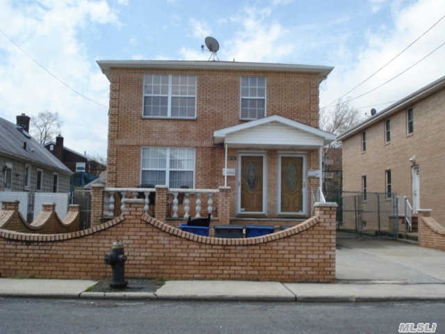 Beautiful Brick Det Two Family In Bayside. Rebuilt In 2006 And 3 Bedrooms 1 1/2 Bath On Each Floor,  Wood Floors , Full Finish. Basement. Separate Entrance,  Best School District#26, Walk To Near All Bus,  Shops,  Lirr,  Major Highways.