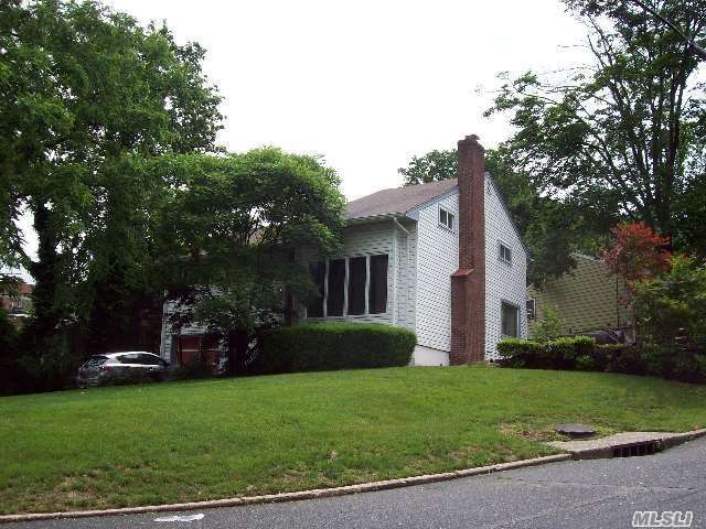 Beautiful Home Located Between Huntington Harbor And Village. Four Bedrooms, Two Baths, Renovated Kitchen, Hardwood Floors.