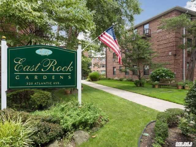 Large 1 Br Corner Unit Offers New Galley Kitchen Maple Wood Cabinets, Stainless Steel Appliances (Dishwasher Possible) & Granite Counter Tops. New Bathroom, Br Has 2 Closets Including Walk-In & Cross Ventilation + 9' Hallway Closet. Updated Roof & Laundry Facilities. Beautiful Professionally Landscaped Grounds. Near Lirr Centre Ave Station.