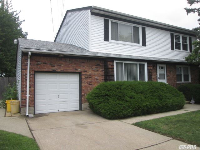 True Two Family Dwelling By C Of O. Excellent Income Opportunity In Bethpage School District. Ideally Located Near Transportation/Stores/Parks. Large Two Bedroom Units. Great Money Maker For  Real Estate Investor. Newer Roof/Siding.