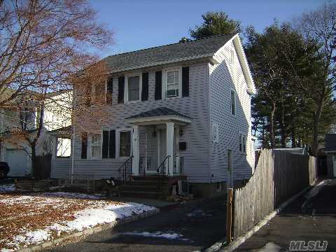 House Is A Legal Two Family House That Can Be Converted To A Single Family.  First Floor Has A Bedroom Suite And Kitchen Has Built-In Cabinets.New Roof, House And Garage (2009).