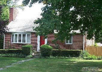 Park-Like Setting Home, This Spacious Brick 1 Family Homes Sits On A Lovely Treed Lot. Hardwood Flooring, 4 Bedrooms, 2 Full Baths, Wood Burning Fireplace. Short Sale - Pending Bank Approval