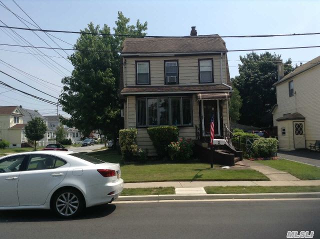 Home Has Been Entirely Renovated With All Top Of The Line Stainless Steel Appliances,  Chinese Hardwood Floors,  Granite Countertops,  All Wood Kitchen Cupboards With Skylight In Kitchen. Zoned Near Famed School District 13.   Accessible To The Lirr,  Mall,  And Highways.  A Must See!