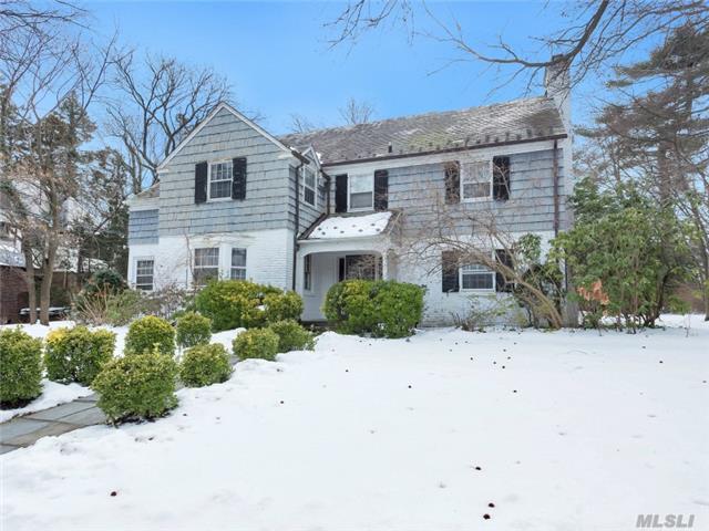 Russell Gardens 1st Time On Market, Spacious Col Lge Entry Foyer, Elegant Formal Lr & Dr, Den, Encl Porch, Kitchen W/Separate Eating Area. Extra Large Master Suite Plus 3 Additional Bedrooms. Stairs To Full Attic.Flat Park-Like Grounds, Russell Gardens Pool/Tennis. Within Close Proximity To Town, Lirr, Buses, Library & Shopping. Lakeville Elementary. Gn South Middle/High.