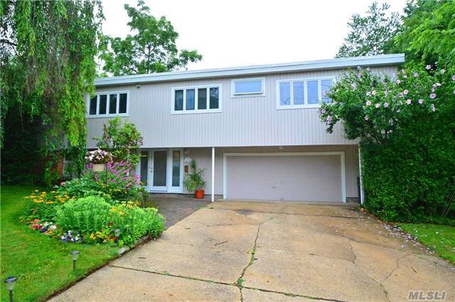 Designed By An Architect For Himself This Contemporary Home Has 5 Bedrooms & 3 Full Baths. This House Has A Trass Roof, Cac, Skylites, Fireplaces, 2 Zone Heat/Gas, Alarm & Walk In Closets.