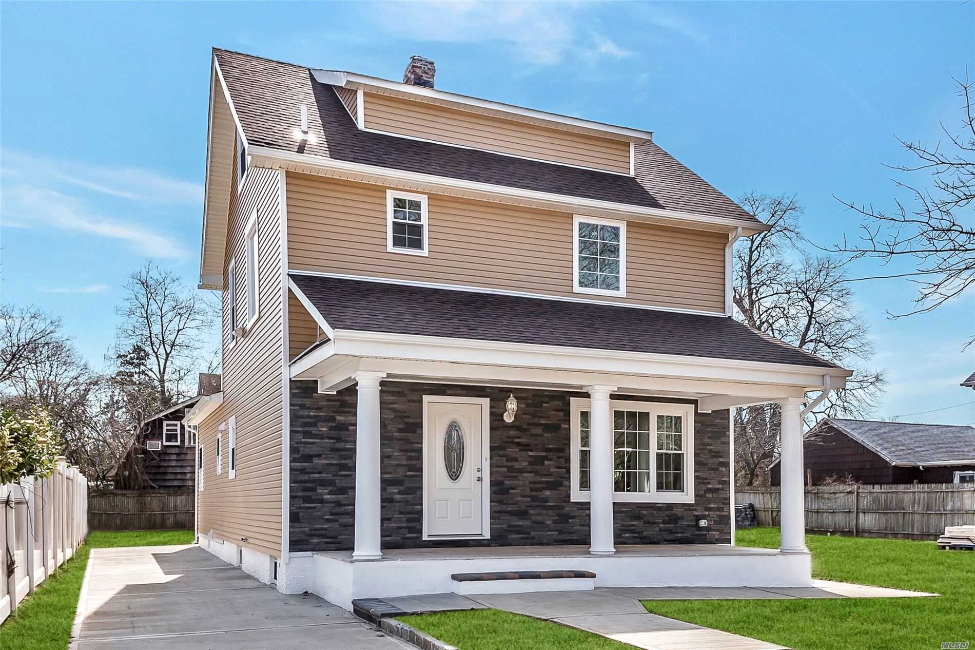 Totally Updated 5 Bedroom Colonial. 2 Full Baths. New Hard Wood Floors. New Plumbing. New Electric. Granite Counter Top. New Cabinets. New Bathrooms. Large Walk Up Attic. 40x125 Lot. Long Driveway. Finished Basement. Close To Transportation And All.