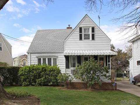 Welcome To This Nice Cape, Located In The Middle Of The Block In The Herricks School District. First Floor Has A Living Room, Eat-In-Kitchen, 2 Bedrooms, And Full Bath. The Second Floor Has 2 Bedrooms And Office. Basement Is Half Finished; Hardwood Floors Throughout, One Car Garage. Updates Include Gas Boiler, Hot Water Heater, And Roof.