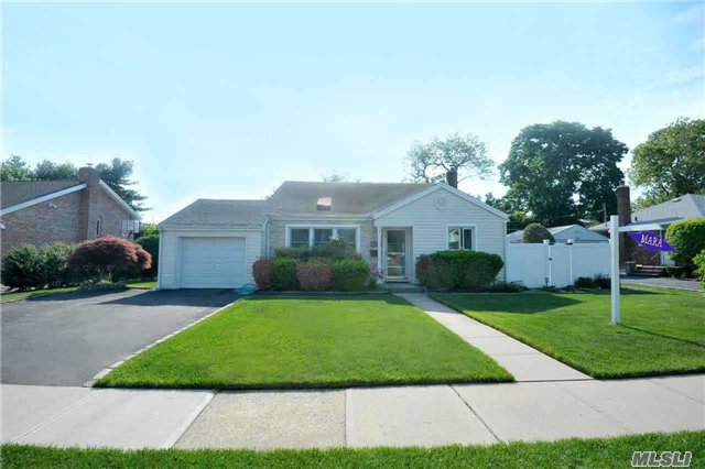 Front-Back Split On Fenced Oversized Property 70X134 5Yrs Old Siding&Roof, Updated Kit & Bathroom, 2 Car Driveway, Hardwood Floors, Sliding Doors To Side Deck, Lr W/ Vaulted Ceilings, Close To All.