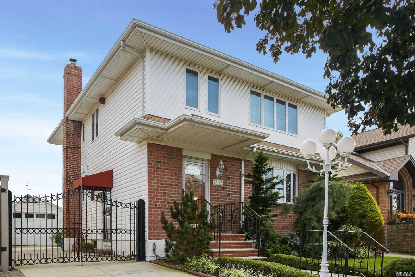 Beautiful 1 Family Detached Home On An Oversized Lot (40X95) In The Heart Of Midle Village Located On A Desirable Block (Penelope Ave). Modern Eat-In-Kitchen W/ Sub Zero Refrigerator, Formal Diningroom, Spacious Livingroom, 4 Bedrooms, Full Finished Basment, Garage, Private Driveway And Private Yard...