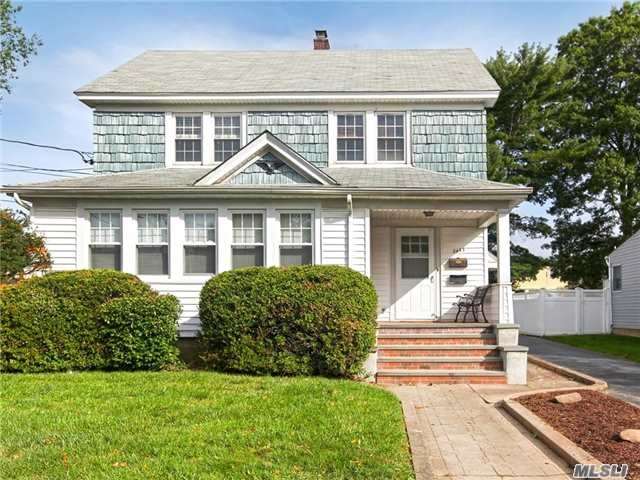 Great Potential In This Supersized Colonial. Can Be Used As Colossal Colonial Or 2Br Over 2 Br Mother/Daughter. H/W Flrs Throughout, 9 Ft Ceilings, Fresh Paint On 2nd Flr, New Windows, Updated Siding, Gas H/W Tank, 2-100 Amp Electric Meters, New Stoops, Unfin.Bsmt W/Ose, , Pvc, Long Driveway, Large 2.5 Car Gar W/Work Area, O/S Property, Mid Block, Close To All!Amazing Value!Wont Last!