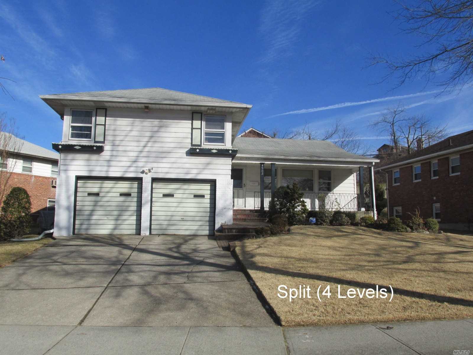Huge Four Level Split On Over Sized Lot; One Block From Oakland Lake; Hardwood Floors Throughout; Attached Two Car Garage Plus Family Room; Brick Fireplace Plus Finished Basement; Three Bedrooms/Two Full Baths.