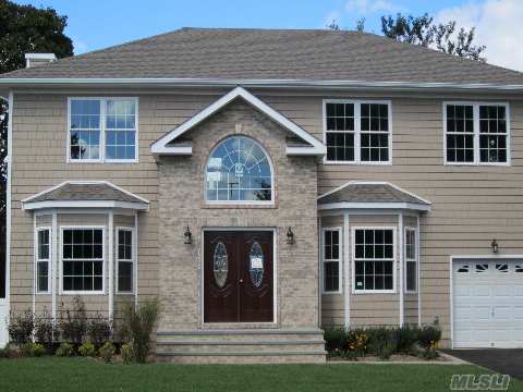 Custom Built 4 Bedrooms, 3 Bath Colonial. High Ceilings Dramatic Entry Exceptional Detail.