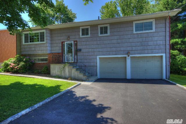 Totally Renovated Hi Ranch In Sought After Syosset,  Open Floor Plan,  Beautiful Remodeled Kitchen And Bathrooms,  With High End Fixture. This House Includes A 2 Car Garage,  New Windows,  New Roof And Cac,  Walking Distance To Lirr. Must See...