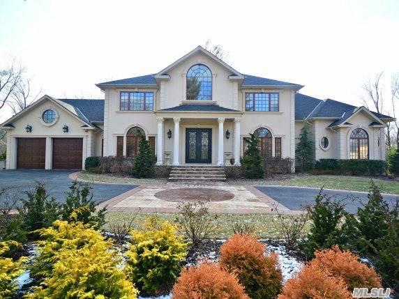 Custom Built In 2013. Grand Foyer With Marble Floor, Dramatic Floor-To-Ceiling Windows & French Doors, Arched Doorways With Greek Columns. Fine Craftsmanship And Architectural Details Throughout, Brick Patio And Inground Heated Pool, Close To Harbor & Golf Course.