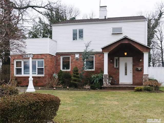 All Updated Colonial In Roslyn, Mid Block Herricks Schools, Magnificent Granite Counter Top Kitchen, Updated Bths, Gas Cooking And Heating.Family Rm With Fireplace. Mint Condition Must See!!!!!