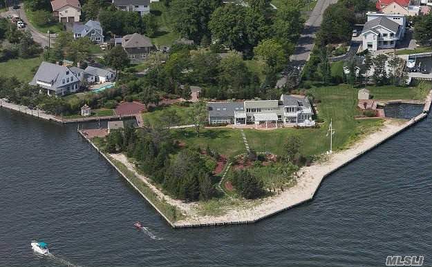 This Spectacular Bay Front Contemporary Is Situated 2.75 Acres With 1000 Feet Of Bay And Canal Frontage. The Expansive Property Features Total Privacy With Two Cut In Marinas, Gazebo And Boat House. The Home Was Untouched By Sandy And Features An Open Style Living Plan With Views From Every Window.