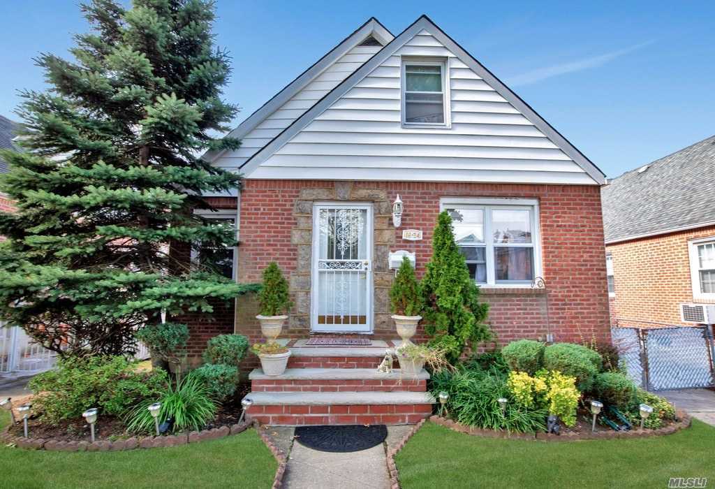 Expaned Cape in The Heart of Fresh Meadows, Hardwood Floors throughout, Many Updates, 4 Bedrooms, Backyard has a feeling like you are on a Greek Island Oasis with a Heated Pool, 2.5 Bathrooms, Close to Busses, Shopping, House Of Worship, School District #26, Come And See!!