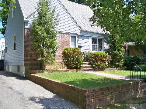 Four Bedroom Renovated Cape, Updated Kitchen & Bath, Hw Floors, New Windows, New Roof & Siding, 2 Car Detached Garage. New Gas Furnace And Hot Water Heater To Be Installed August 1st.