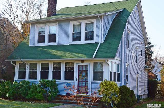 Dutch Colonial Conveniently Located In Pw Close To Main St Shopping&Lirr.Great Curb Appeal &A Desirable Mid-Block Location Draws You Into An Enclosed Front Porch Facing East.Large Lr W/Wood Burning Fp.Fdr W/Coffered Ceiling, Den/Fr W/Powder Room & Sliders To Deck. Modern Eik Also Has Access To Rear Deck&Garden.The 1.5 Car Garage Has A New, Manual Garage Door.