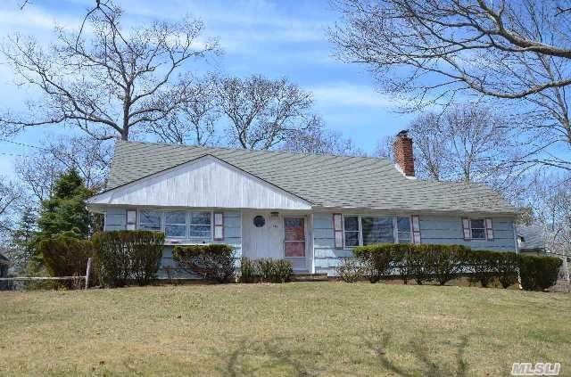 Fabulous Location With Bay Views Over Fleets Neck To Nassau Point! This Home Rests Atop A Hill Overlooking Peconic Bay And Is 125 Feet From The Beautiful Fleet's Neck Association Beach. A Casual And Comfortable Home With A Large Country Kitchen,  Brick Fireplace And Wood Floors. A Great Entertaining Space Both Indoor And Out On A Large Sunny Deck.