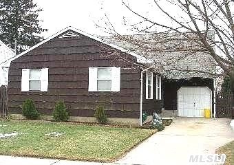 1983 House Needs Updating However, It Has New Siding, New Roof, New Windows, And New Heating Equipment.Walk To Rr, Bus, Quaint Village Shops, Schools, And Houses Of Worship.Walk To Every Convenience.