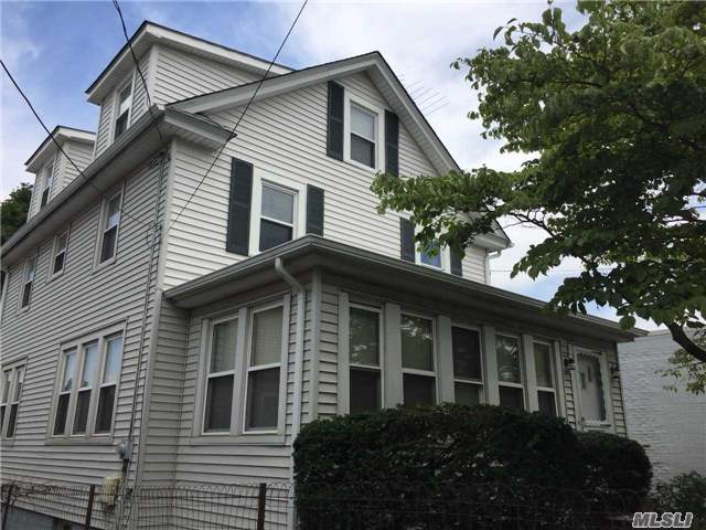 Updated Windows, Siding, Roof & Gutters. Hardwood Floors Throughout. Finished 3rd Level Loft. Living Room With Fireplace.