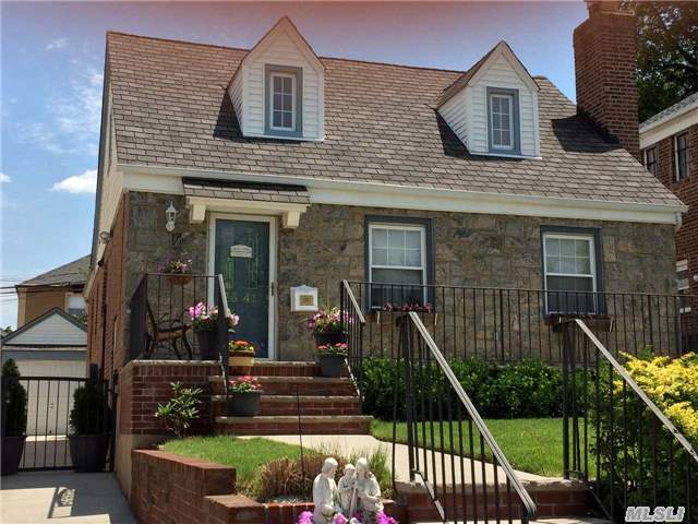 Fill The 'Fridge And Plug In Your Television - This Renovated Brick & Fieldstone Cape Is Turn-Key Ready! A Large Gross Morton Model, This Updated Home Is Located On A Prime Block In The Heart Of Fresh Meadows. Close To Shopping, Restaurants, Transportation And St. John's University.