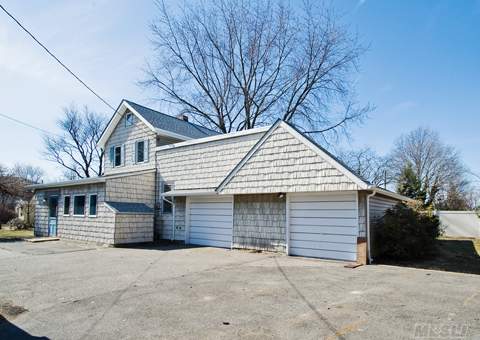 Best Priced Home Is Bethpage. 2528 Square Foot 2 Story Home With Arched Doorways And Character Throughout. Updated Roof, Siding And Windows Within Last 3 Years. 1300 Square Foot 6 Car Garage. Home Sits On Private 1/4 Acre **Cash Deals Only**