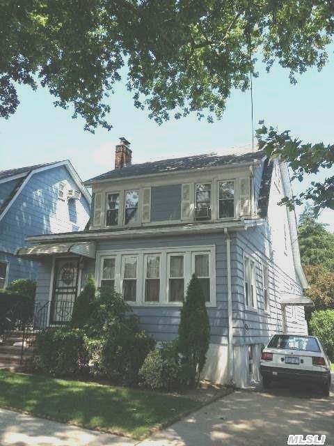 Lovely Det. Colonial On A Quiet Block, Heart Of Flushing North. Deceiving From Outside, Large Rooms, Lr W/Fireplace, Huge Fdr, Possible 4th Br On 1st Fl. Great Location Near All.Full Walk Up Attic Can Be Used As 4th Br ( Has No Heat ) First Floor Has Two Extra Rooms ( Can Be Br's ) And A Full Bath