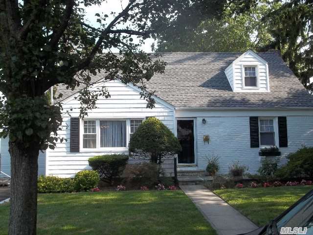 Outstanding,  Amazing Center Hall Cape On Oversized Property On Dead End Street. Huge 3 Season Porch,  Finished Basement,  2 Car Attached Garage. Totally Updated. New Thermo Windows,  New Roof,  New Siding,  Upgraded Electric,  Underground Sprinklers,  Large Dining Room,  Upgraded Baths,  Granite Counter In Kitchen.