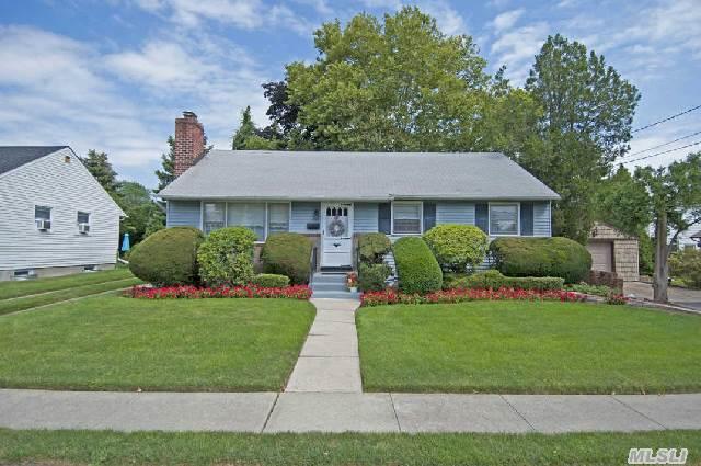 Beautifully Maintained Large Spiegel 3 Bedroom 1.5 Bath Ranch.  Living Room,  Dining Room,  Eat In Kitchen,  Fully Finished Basement Perfect For Entertaining.  Large Rear Deck,  Detached 1.5 Car Garage.  Nice Rear Yard.  Great Curb Appeal.  Bethpage Schools.