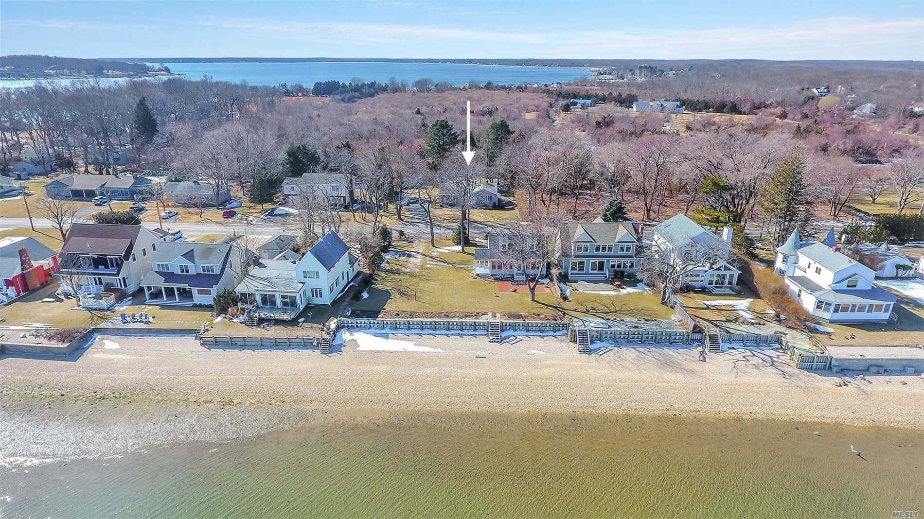 Charming Two Bedroom, Two Bath Waterview Cottage With Unobstructed Views Of Pipes Cove To Shelter Island. Easy Access To Sandy Bay Beach And Greenport Village. All Oak Flooring, Cac, Outdoor Shower, Large Rear Deck Overlooking 1/3 Acre Property. The Perfect North Fork Getaway.