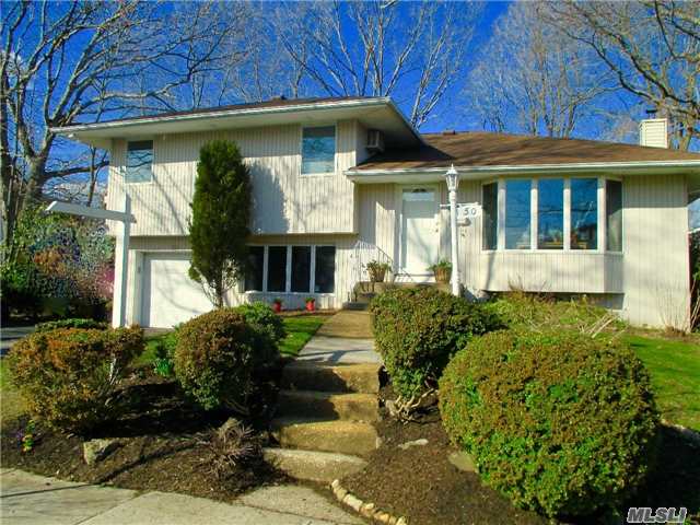 Perfect Mid-Block Location-Quiet Street In The Heart Of E.Birchwood. Expanded 4 Bdrm/2 1/2 Bth Split-Level Home Just Two Blocks From Jackson Elementary. Jericho Schools! Bright & Sunny Frml L/R With Bay Window, Frml D/R, Anderson Windows, Wood Flrs, 1 Car Garage W/House Entry. Oversized Master Suite W/Walk-In Clst & Prvt Bath. Alarm Systm, Ug Sprinkler, Tax $14, 154 W/Star