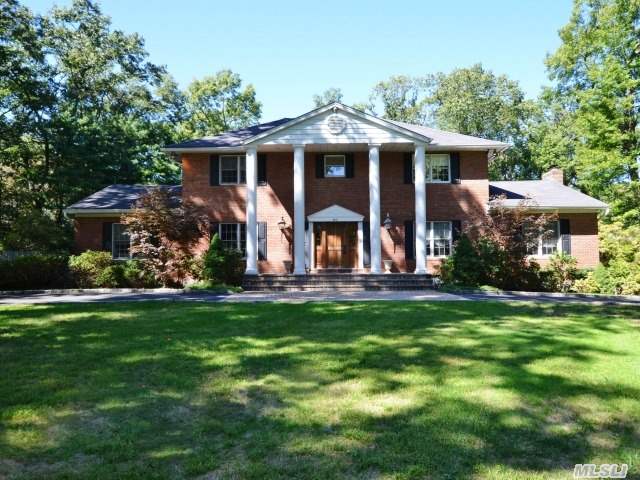 Grand Colonial With Bridal Sweeping Staircase. Radiant Heat In Foyer.  Wood Flooring Thruout And Custom Moldings. Den With Gas Fireplace And Wet Bar.  Great Home For Entertaining- Open Floorplan! Gas Heat And Cooking,  3 Zone Cac,  12 Zone Igs! Berry Hill Elementary- Syosset Sd.