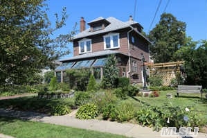 Old World Craftsmanship Abounds In This Circa 1920 Colonial, Lovingly Maintained Home Situated On Private Large 100X100 Property, Front Of Home Faces South With Sunny Enclosed Porch. High Ceilings,  Grand Dr W/Beamed Ceiling, Gorgeous Oak Panels, 3 Brs, 3 Bths, Bonus Room In Attic,  Walk Up.