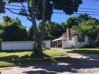 Sears & Roebuck Ranch Situated On Quiet Block W/ Vinyl Sided Ext., Lr W/ Brck Fpl & H/W Floors, Eik W/ Gas Cooking, 2 Brs W/ H/W Floors, Fin Bsmt W/ Bath, Attic W/ 3 Windows. All Windows Replaced, Det 1 Car Garage, Gas Heat, Sep Hw Heater, 150 Amp Electric. This Property Has 60 X 100 Lot, Additional 40 X 100 Lot To The Left, Taxes Are Inclusive Of Both.