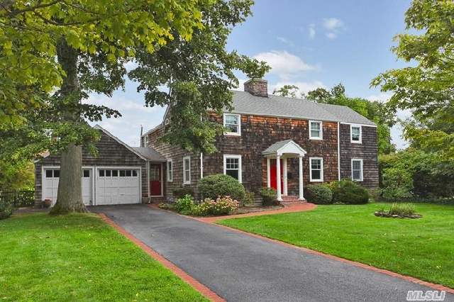 Charming Brightwaters, Colonial South Of Montauk H'way. With Upgrades In Kitchen And Family Room,  Baths,  Roof,  Windows,  Cedar Shakes,  Heating System,  Cac, 2 Units,  2 Hot Water Heaters,  Driveway, Front Steps,  Anderson Windows,  Hardwood Floors,  Private Backyard Surrounded By A Perennial Garden.