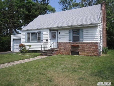 Make Your Dollars Work...Be A Landlord!!  Opportunity In Prime Village Loc,  3 Blks To Town & Li Railroad. Lr, Dr, Eik, 2Br, Fbth, Bsmt, Gar. Plus Huge Unfin. Attic Can Be Easy Additional 2 Bedrooms,  Priv Fenced Yd,  Gas In Hse,  Txs Do Not Reflect Star Savings.  This Home Is Sold Strickly As Is...Ready For That Handy Buyer That Wants To Build His Own Tax Shelter.Cash Or Financing