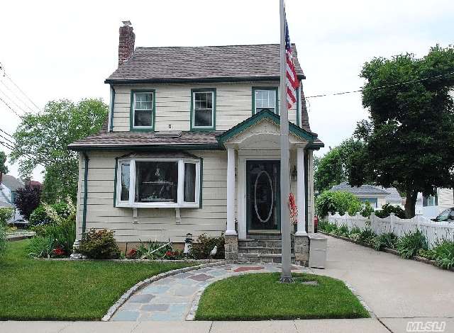 Picture Perfect Colonial With South-West Exposure. Immaculate Landscaping With In-Ground Sprinkler System. Beautiful Moldings & Top Notch Craftsmanship Details Throughout. Skylights In Living Room & Family Room. Brand New Roof. Private Driveway With 1.5 Car Garage. Walking Distance To L I R R ,  Bus,  Park & Lakeville Elementary School. A Must See!!