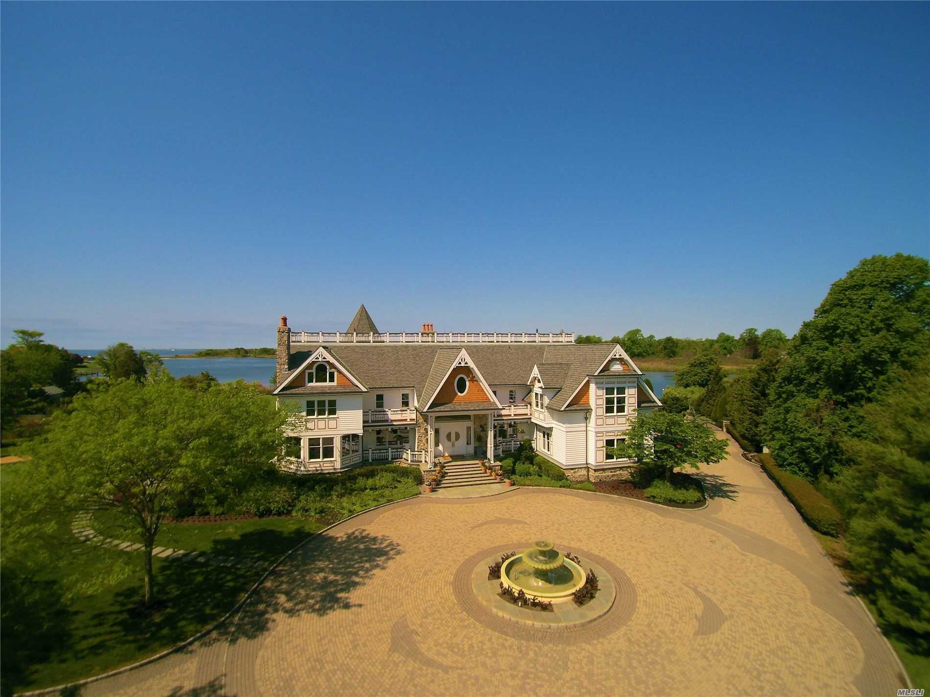 Story Book Mansion on The Champlin River, across from Seatuck Nature Preserve.3 Stories w/ 60&rsquo; Widows Walk Accessible from 2 Story Master En Suite. Meticulously maintained at all times! Contractors House, No Expense Spared! Gated on Cul-de-Sac with Expansive Circular Driveway. Thoughtfully Positioned on Property for Ultimate Panoramic Water Views. True Chefs Kitchen w/Stone Wall Cooking Station. 50x60 Deep Water Slip w/227&rsquo;Bulkhead. Enchanted, Magical Home and Property.