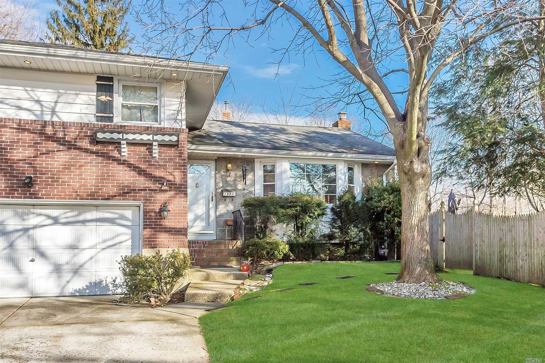 Beautiful 4 Level 3 Bdrm 2 1/2 Bath Merrick Manor Split On A Cul-De-Sac On Private, Park-Like Grounds! Eik, Living Rm W/Gas Fireplace, Fdr, Hardwood Floors, Den W/1/2 Bath, Finished Basement. Updates Include: 2013 Gas Heating System, Hw Heater, 200 Amp Electric, 2016 Cac Compressor, 2008 Updated Bathrooms, Windows In Living And Dining Rm. Won&rsquo;t Last!