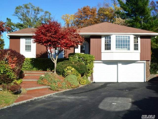 Beautiful 3 Bedroom, 2 Bathroom, High Ranch With Spacious Entry Foyer, Formal Living Room, Dining Room, Family Room With A Fireplace, Huge Eik, New Kitchen With Top Of The Line Appliances And Granite Counter Tops. Walk Out Of The Kitchen To A Beautiful Deck Followed By An In-Ground Pool With Bamboo Surrounding It. Hardwood Floors Throughout. Must See!