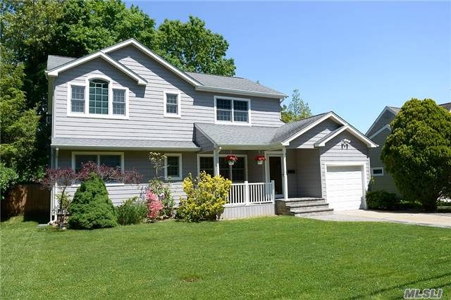 Charming & Pristine Colonial With Front Porch On Quiet North Syosset Street. Second Story Was Added In 2000- Large Master Bedroom With Soaring Ceilings And Picture Windows, Large Closets!! Open Floor Plan On First Floor With Living Room, Eik, Den...Large Basement. This Is A Gem- Don&rsquo;t Miss It! Convenient To Railroad And Shopping!