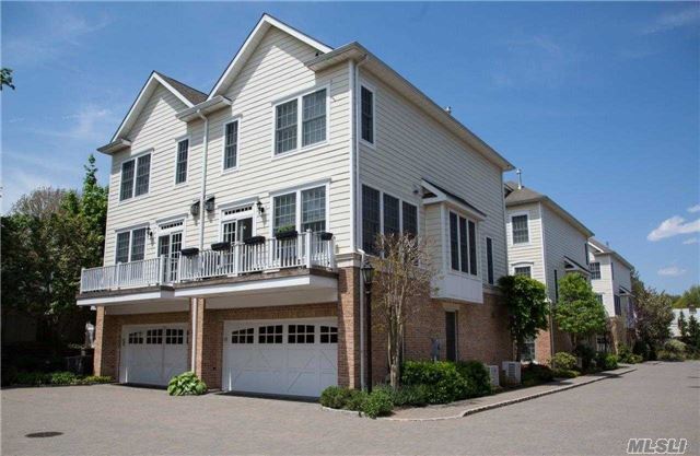 Great Opportunity To Get Into Mariners Walk And Own This 3-Story Town House In The Historic Village Of Oyster Bay! Enjoy The Beautifully Maintained Landscaping As Well As Large Clubhouse Including A Great Room, Gym, And Card Playing Room. Hardwood Floors Throughout Unit, Gas Burning Fireplace And 2 Car Heated Garage. This Town House Also Has Its Own Private Patio!