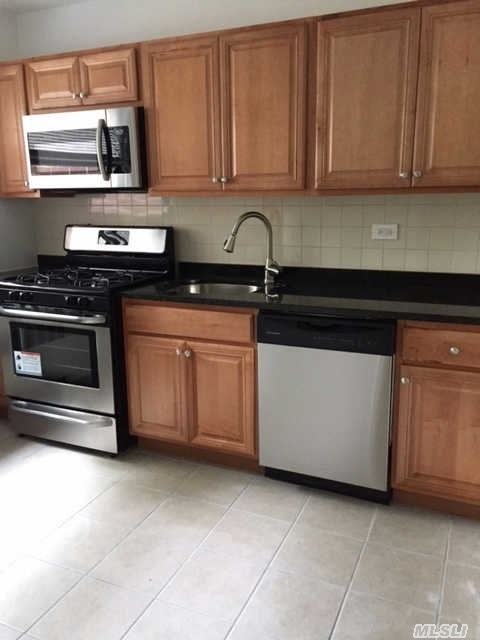 Newly Renovated 2 Bedroom/1 Bath Garden Apartment On The First Floor. Brand New Granite Kitchen With Stainless Steel Appliances, Glass Tile Bathroom, Hardwood Floors.